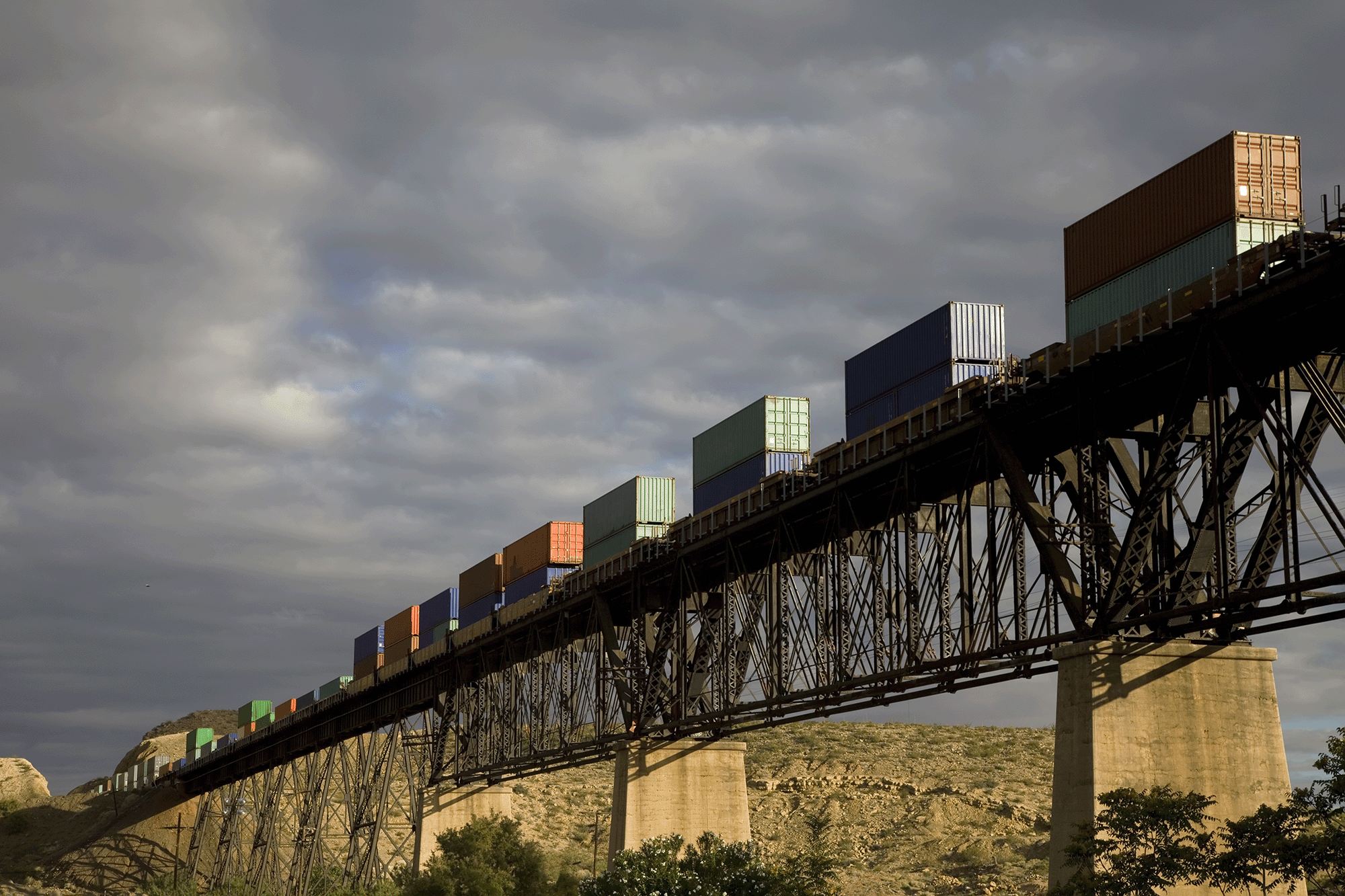 cargo train on bridge