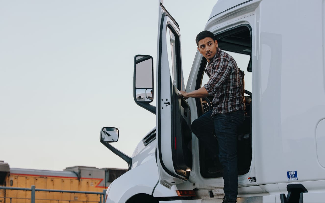 Driver getting out of commercial truck